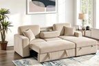 Beige sectional sofa in a living room with a plant and artwork on the wall.